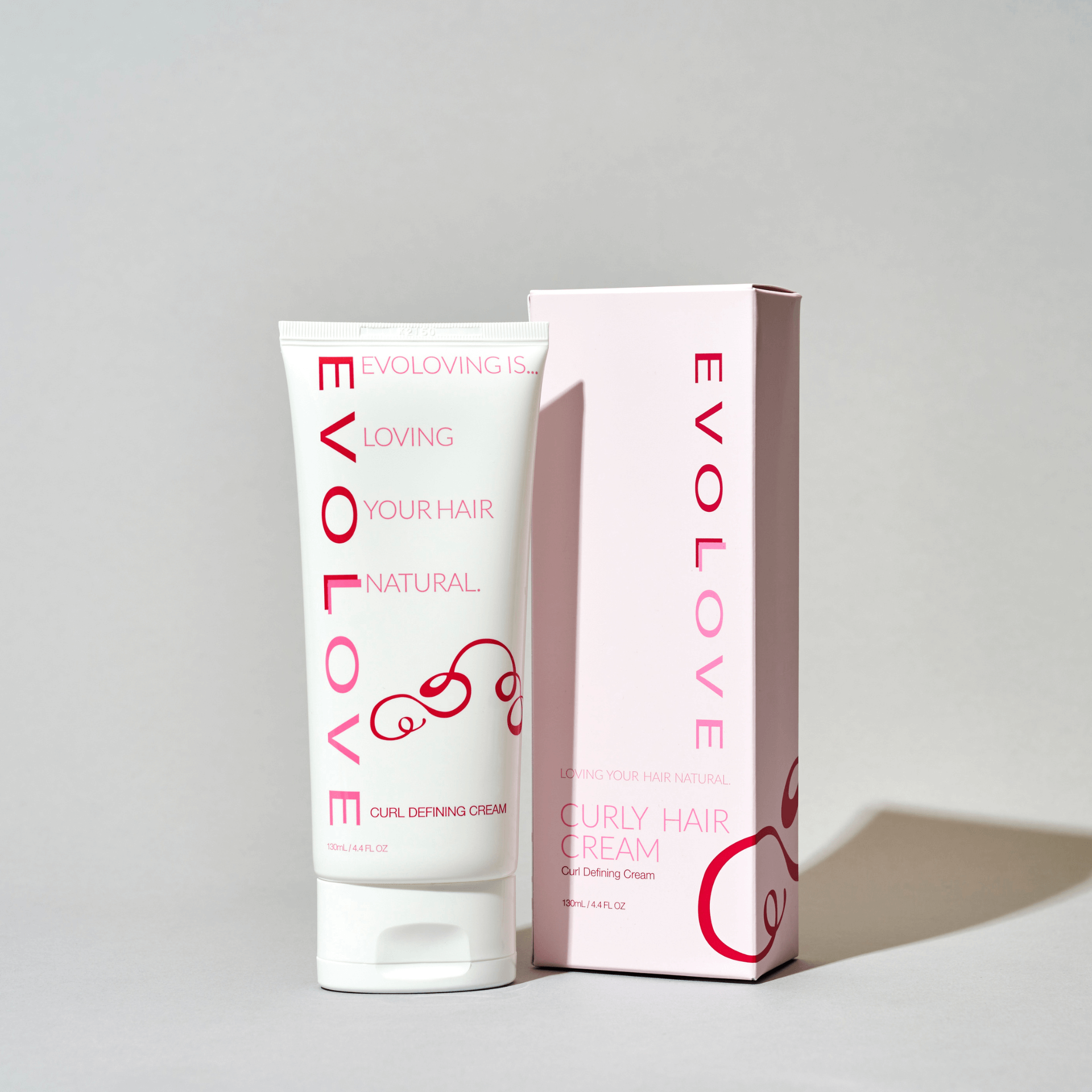 A lightweight curl defining cream for curly hair.