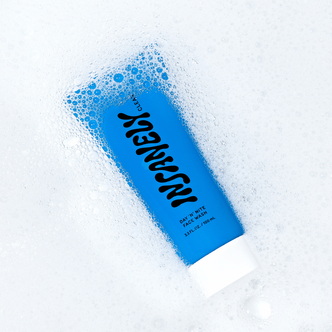 The best men's face wash for everyday cleansing floating water full of bubbles.
